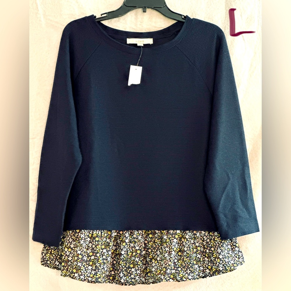 LADIES NAVY BLUE SWEATER WITH BLUE, YELLOW & PINK FLOWERS AT THE BOTTOM
